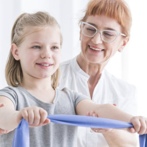 caregiver with little girl