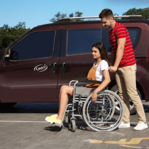 Man helping disabled woman to ride