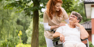 elderly patient with her nurse