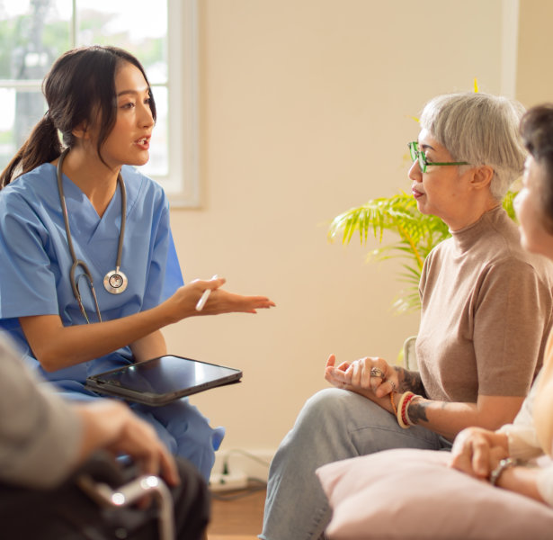 caregiver talking to seniors