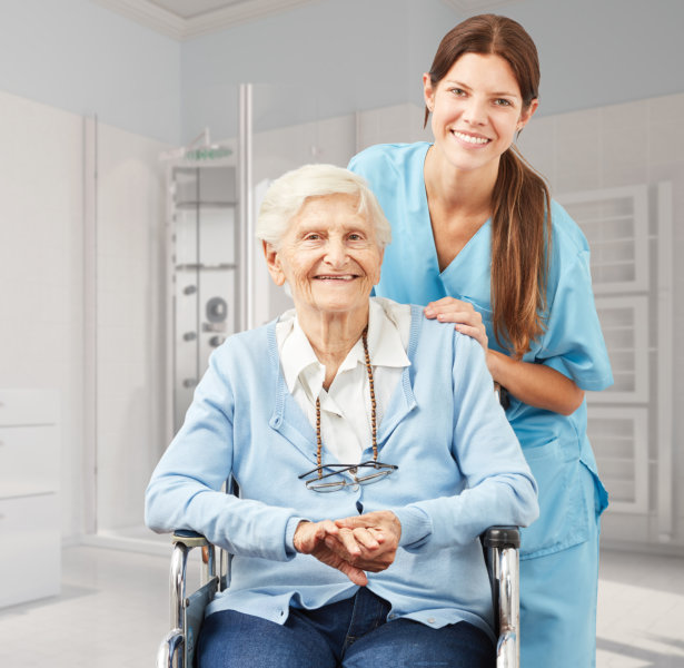 caregiver and senior woman smiling