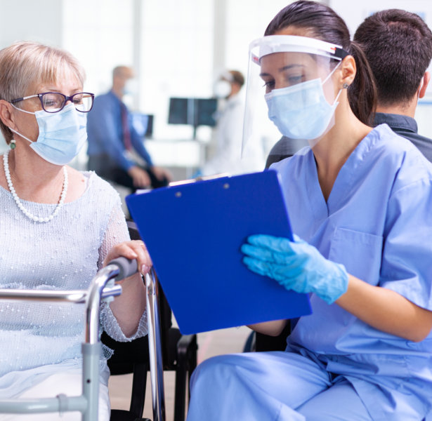 medical personnel checking patient